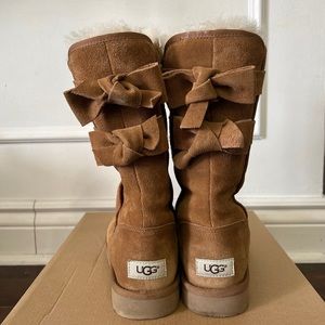 Ugg high boots with suede bows